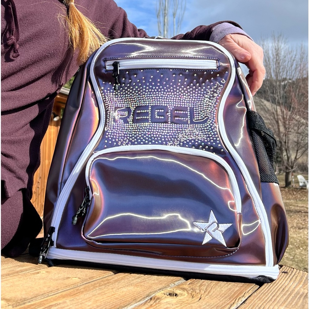 Brand New! Never used Rebel PURPLE/BLUE BACKPACK for travel, hiking or the gym
